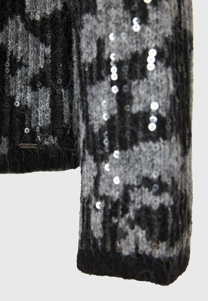 Λεπτομέρεια μαύρου λεοπάρ σχεδίου και παγιετών