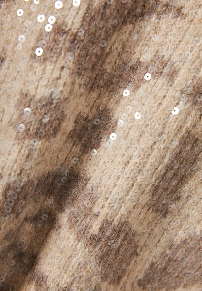 Λεπτομέρεια εκρού λεοπάρ σχεδίου και παγιετών