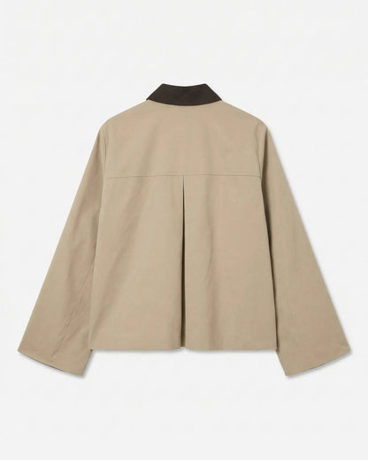 Κοντό μπουφάν Vero Moda μπεζ, flat lay πίσω όψη με κουφόπιετα
