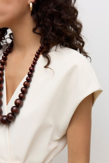 VERO MODA γιλέκο ασύμμετρο εκρού - λεπτομέρεια μανικιού